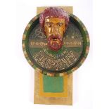 1984 Luke Kelly commemorative sculpture. A folk-art sculptural caricature of Luke Kelly mounted on a