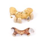 A pair of gold dentures. Two gold plates set with teeth. Holroyd Smith family;Catherine Fleming;