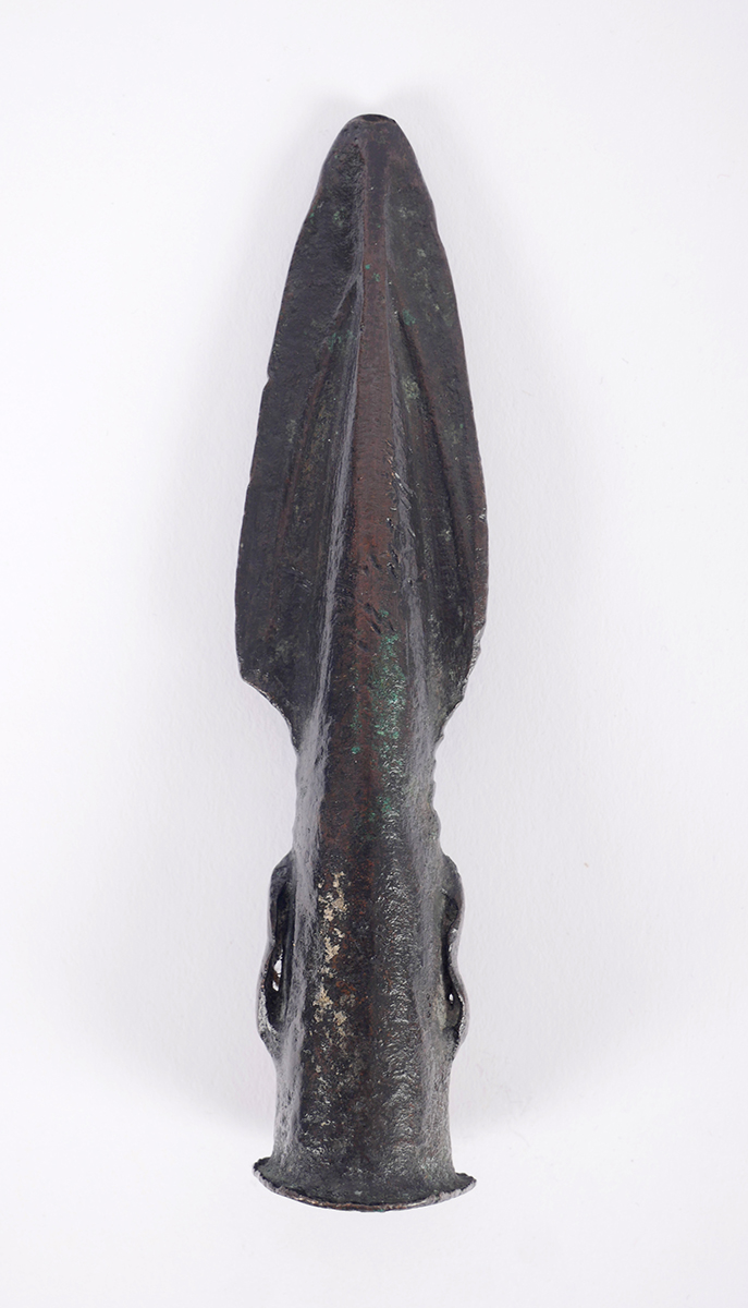 2nd Millennium BC Bronze Age Irish spearhead. An Irish bronze socketted spearhead with tapering