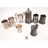 1860-1930 Collection of silver and pewter rowing trophies and a rowing brooch. The gilt metal and