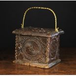 A 19th Century Dutch Dark Stained Beech-wood Foot-warmer of rectangular form intricately decorated