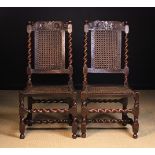 A Pair of 19th Century Carolean Style Caned Walnut Chairs.