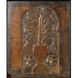 A Delightful 17th Century Oak 'Flowerpotte' Panel (A/F) naively carved in a arched rebate with a