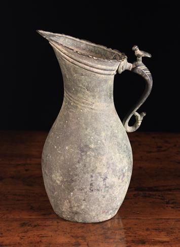 An Antique Iranian Copper Pitcher.