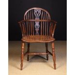 A 19th Century Yew Wood Low Hoop-backed Windsor Armchair, attributed to Nottinghamshire.