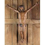 A Primitive 17th Century Spanish Polychromed Carved Wood Corpus Christi, 27 in (68.5 cm) in height.