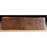 A Pair of 16th Century Oak Dolphin Panels carved in low relief with scaly sea-creatures sprouting
