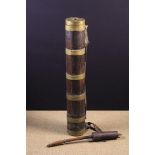 A 19th Century Tall Slender Coopered Cylindrical Plunger Churn bound in reeded brass straps with a