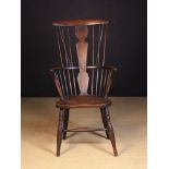 A 19th Century Comb-back Windsor Armchair.