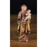 A Small and Charming 17th Century Polychromed Wood Carving of Madonna & Child,