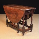 A Good George II Oak & Walnut Gate Leg Table.