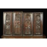 A Set of Four Early 16th Century Breton Panels carved with saints in ogee arches and bordered by