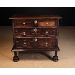 A Charming Charles II Oak & Walnut Chest of Drawers.