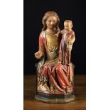 A 16th Century Polychromed Wood Carving of the Enthroned Virgin & Child.