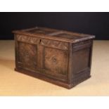 A 17th Century Carved Oak Coffer.