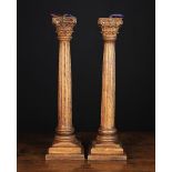 A Pair of 20th Century Carved Oak Corinthian Column Side Lamp Stands.