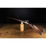An Early 19th Century Twin-barrel Flintlock Shotgun.