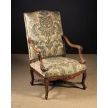 A Fine 19th Century French Carved Walnut Armchair in the 18th Century Style.