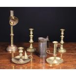 A Collection of Metalware: A pair of Victorian brass candlesticks with push-up ejectors, 8½ in (21.