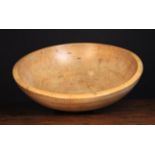 A Large& Fine 19th Century Sycamore Dairy Bowl with decorative turning to the exterior on a