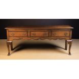 A Queen Anne Style Oak Low Dresser inlaid with mahogany cross-banding.