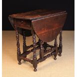 A William & Mary Gateleg Table.