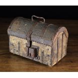 A 16th Century French Dome Topped Casket (A/F) bound in iron straps with traces of residual cuir