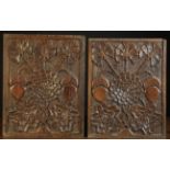 A Pair of Fine 17th Century English Carved Oak Panels decorated with cornflowers springing up from