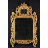 An 18th Century Carved Giltwood Overmantel Mirror.