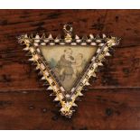 A 17th/18th Century Triangular Base Metal Pendant having a parchment inset painted with Saint