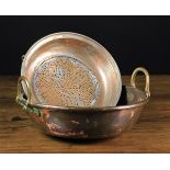 An 18th Century Copper Colander with decoratively pieced draining holes to the centre,