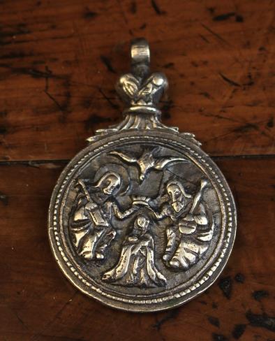 A White Metal Ecclesiastical Roundel Pendant, Circa 1600,