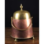 An Early 19th Century Copper "Doofpot" or ash pot having a round body tapered to the top with brass