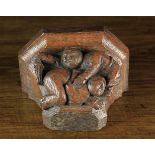 A 19th Century Medieval Style Carved Oak Corbel/ Misericord depicting a man spanking a bare