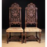 A Pair of 18th Century Side Chairs in the manner of Daniel Marot.