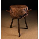 A Impressive Burr-wood Chopping Block composed of a 10 in (25 cm) thick cross section of burr