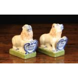 A Pair of Small Late 17th Century Style Delft Lions bearing shields inscribed 'Pro Patria' and