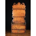 A Good Late 18th/Early 19th Century Boarded Oak Spoon Rack with mahogany cross-banding.