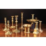 A Collection of 18th Century Brass Ware; A Pestle & Mortar and eight various Candlesticks.