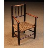 A 19th Century Lancashire Dales Turned Ash & Alder Child's Spindle-back Armchair with a woven