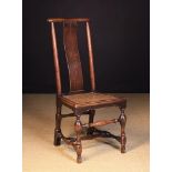 An Early 18th Century Walnut Side Chair.