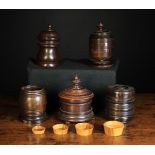 Five 19th Century Treen Jars of turned lignum vitae and coromandel;