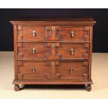 A Late 17th/Early 18th Century having three long drawers with geometric moulding,