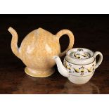 A Peach-shaped lid-less Cadogan Teapot with sponged ochre glaze having a DN&P Nanheim label to base