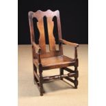 An 18th Century Joined Oak Armchair.