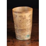 An Early 19th Century Horn Beaker engraved with a hunting scene spiralling around the sides,