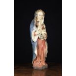 A 17th Century Polychromed Wooden Sculpture of Virgin & Child.