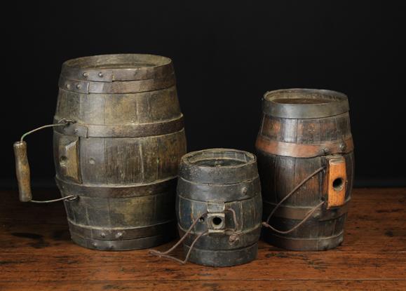 Three 19th Century Iron-bound Oak Coopered Costrels of barrel form, 11 ins (28 cm),