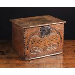 A Small 18th Century Boarded Oak Box of rectangular form. The lid on iron strap hinges.