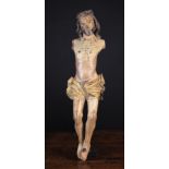 An 18th Century Carved Oak Corpus Christi with residual polychrome and gilding,